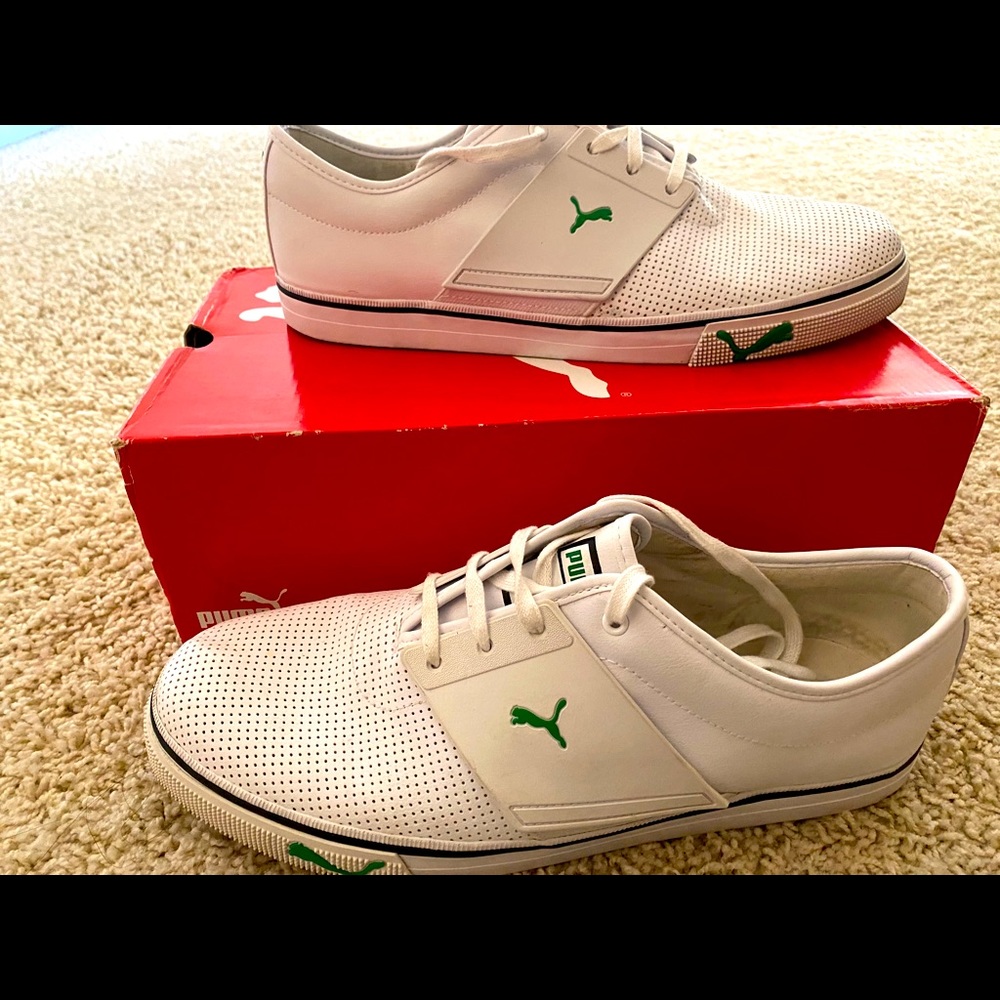 Slightly Used White and Green Puma Boat Shoes.